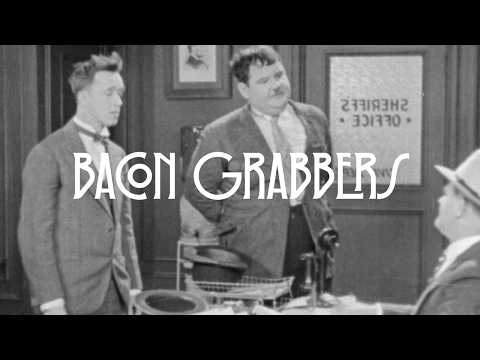 Laurel & Hardy keep forgetting their hats